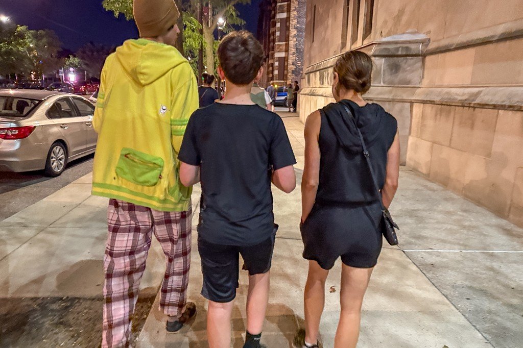 Sarah, Liem, and Oliver walking at night